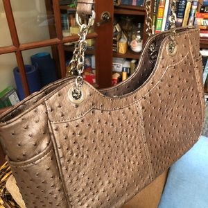 Roomy and unusual taupe handbag